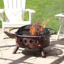 Sunnydaze Decor Sunnydaze Outdoor Camping Or Backyard Crossweave Cut Out Fire Pit With Spark Screen, Log Poker, And Metal Wood Grate - Bronze