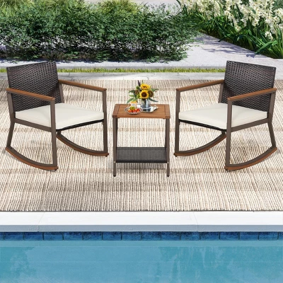 Costway 3PCS Patio Rattan Rocking Chair Bistro Set Armrest Cushion Table With Storage Shelf 1 Costway 3PCS Patio Rattan Rocking Chair Bistro Set Armrest Cushion Table With Storage Shelf