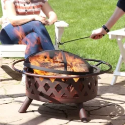 Sunnydaze Decor Sunnydaze Outdoor Camping Or Backyard Crossweave Cut Out Fire Pit With Spark Screen, Log Poker, And Metal Wood Grate - Bronze -Deals Patio Elegance Store GUEST a8fcb32a ec37 4322 bea9 015441fcd73f